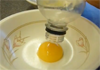Paul Smith Separates an egg